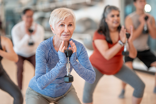 Group Fitness Class with Seniors Focusing on Strength and Balance